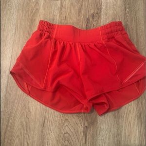 LuluLemon Brand new red tracker shorts size 4 great condition